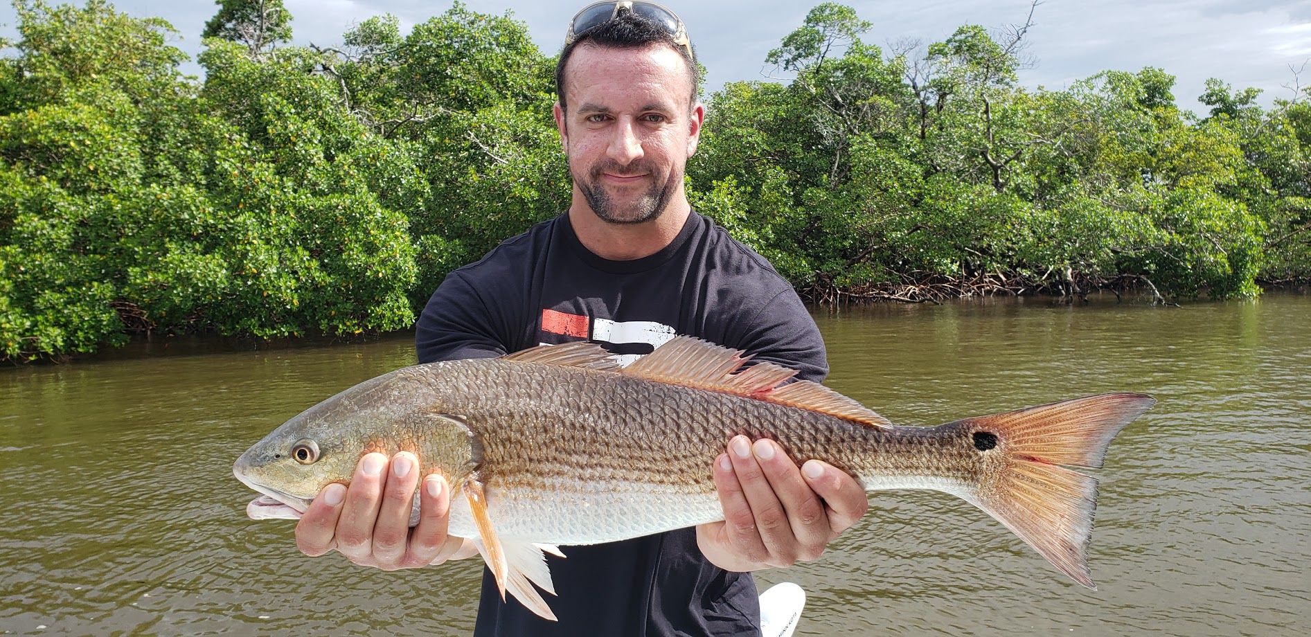 Florida Couple comes over from east coast and sees red! Redfish, that ...