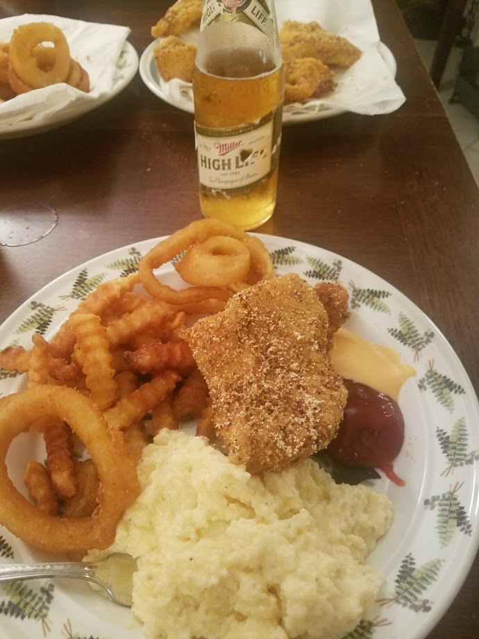 Fried Redfish always goes well with onion rings and french fries!